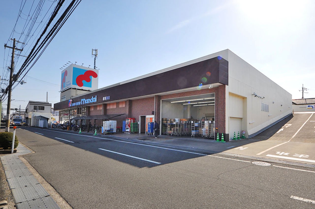 万代堺草部店
